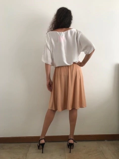 Saia Curta Jersey Bege Brilho na internet