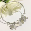 Pulseira rígida pingentes