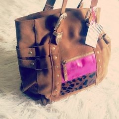 Cartera cuero descarne combinada con pelo print y cuero fucsia