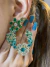 Madelaine tourmaline earring on internet