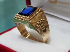 Anillo de caballero de oro 18K con piedra azul con corona en internet