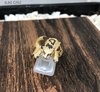 Anillo Leopardo con piedras en oro 18K