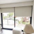 Cortinas roller blackout premium a medida instaladas en ventanales grandes de un living moderno
