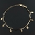 Pulseira min estrelas penduradas