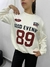 Buzo 89 color crema