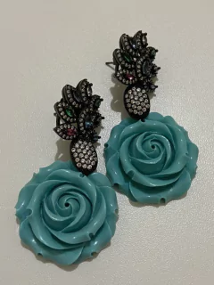 Brinco flor turquesa