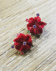 Brinco flor pedras coloridos na internet