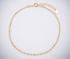 Tornozeleira bolinhas banhada a ouro 18k