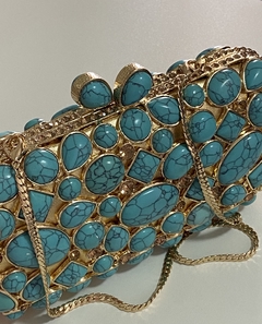 Clutch pedraria turquesa