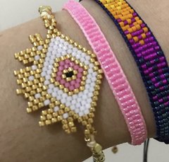 Pulseira olho dourado e rosa P