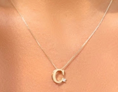 Correntinha letra zirconia banho ouro 18k na internet