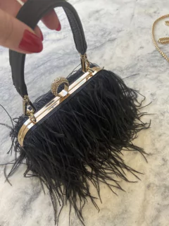 Clutch plumas na internet