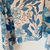 PAREO PASHMINA FLOR DE CEREZO CELESTE
