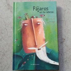 PÁJAROS EN LA CABEZA