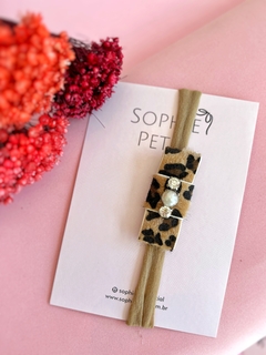 Faixa Baby Laço Chanel Oncinha Pedraria Stella - comprar online