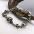 Pulsera calaveras y cruces 068