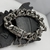 Pulsera grumet calaveras y cruces - comprar online