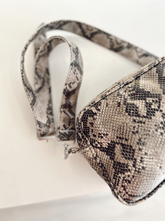 BANDO TINA REPTIL en internet