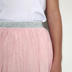 Pollera de microtul elastizado para niña, en color rosa y cintura con elástico glitter plata