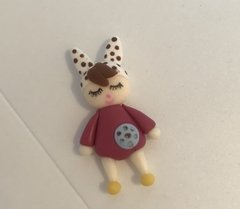 Aplique de biscuit Boneca Metoo na internet