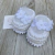 Sapatinho de Tricô 3 Flores - Branco - Modelo Sandália - comprar online