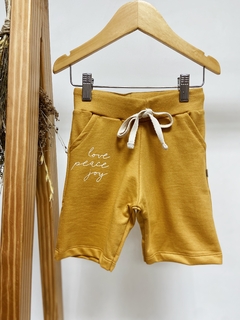 Pronta entrega - bermuda jogger moletinho mostarda escrita - comprar online