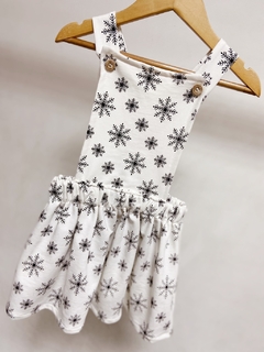 Pronta entrega - Salopete kids frente botões madeira transpasse costas off flocos de neve preto - loja online