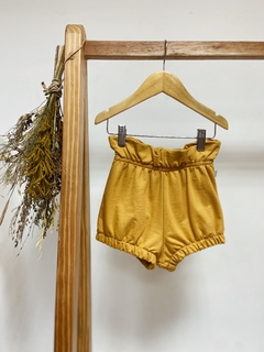 Shorts kids cintura alta Moletinho mostarda