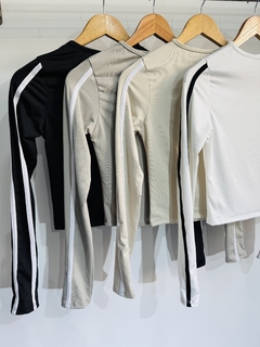 Remera corta lycra dama con tiras (T. Aprox: M) en internet