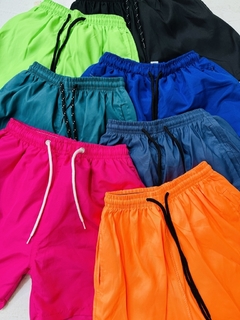 Short baño liso con etiqueta con suspensor JUVENIL