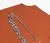 Camiseta Disturb Safety Pin In Orange na internet
