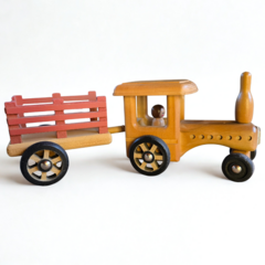 Tractor de juguete artesanal de madera con carrito desmontable y figura de conductor