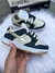 Tenis Dunk Blue Golden na internet