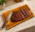 Tábua de Churrasco Teca 42x28x2cm "Clássica" na internet
