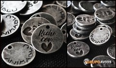 chapita con logo - Medida 15 mm de diametro x 1000 unidades en internet