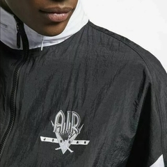 CAMPERA JORDAN RETRO 9 BLACK WHITE en internet