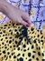 Conjunto Batinha Amarelo Oncinha. na internet