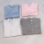 Enterito con broche azul liso - SOLUNA KIDS