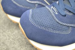 Tênis New Balance 574 na internet