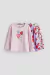 Camiseta rosa con corazones