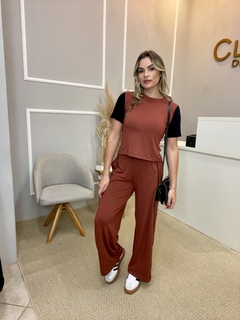 Conjunto blusa e calça malha P na internet