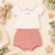 Conjunto Bebê Menina Social Blusa Gola Boneca e shorts na internet