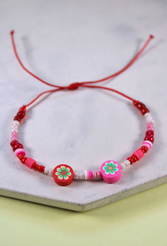 Pulsera flores rojas en internet