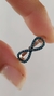 Anillo Infinito en Plata Rodinada con Piedra