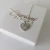 DIJE CORAZÓN PIECITOS - Plata 925 - comprar online