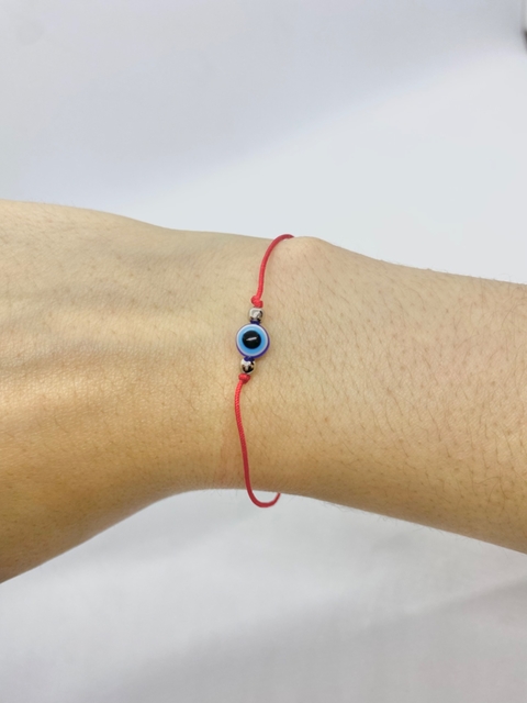 Pulsera hilo protector simple con ojito, acero y regulable