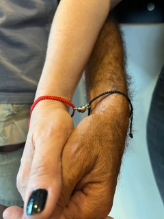 Pulsera pareja para compartir imán en internet