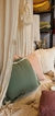 Almohadon gasa verde seco con peluditos 60 x 60 - comprar online