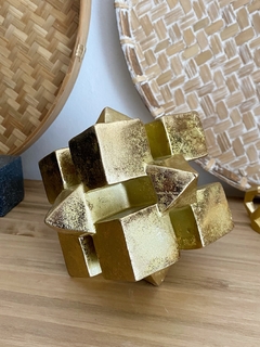 Adorno Cubik Gold en internet