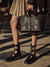 Bag 100% cuero con charms de las letras de la marca. - tienda online